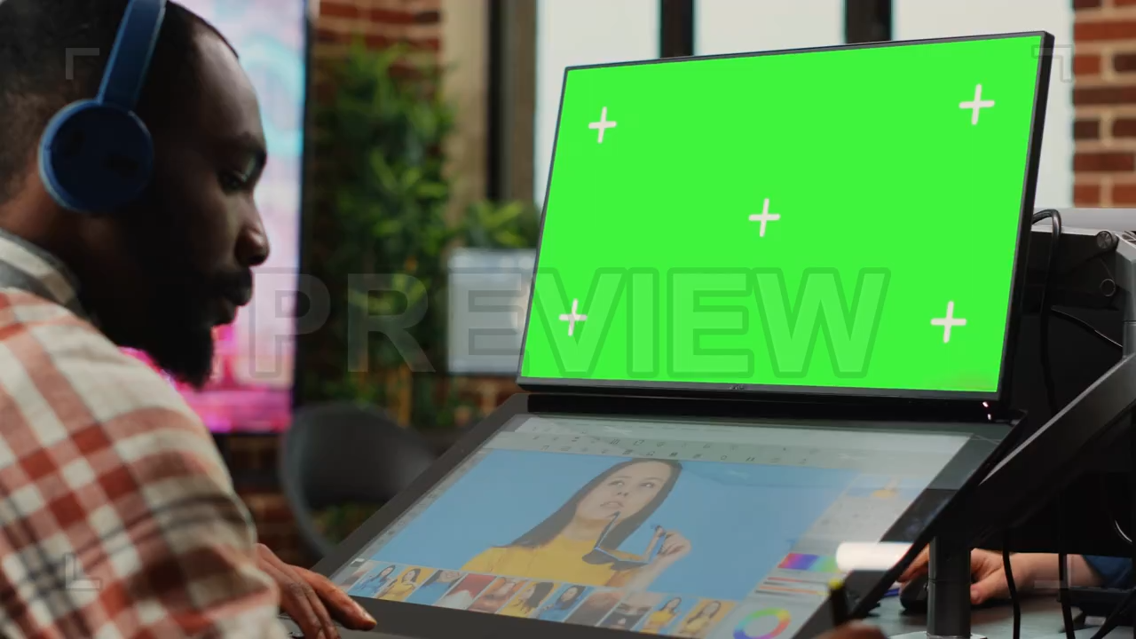 Employee Working With Green Screen